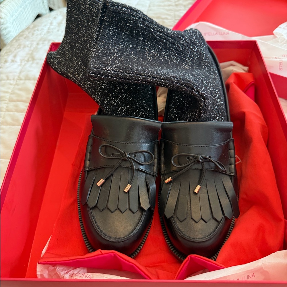 Black Loafers with Fringe Detail